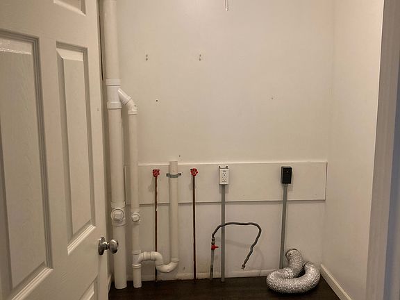 Adjacent to kitchen, has gas and electric hookups.