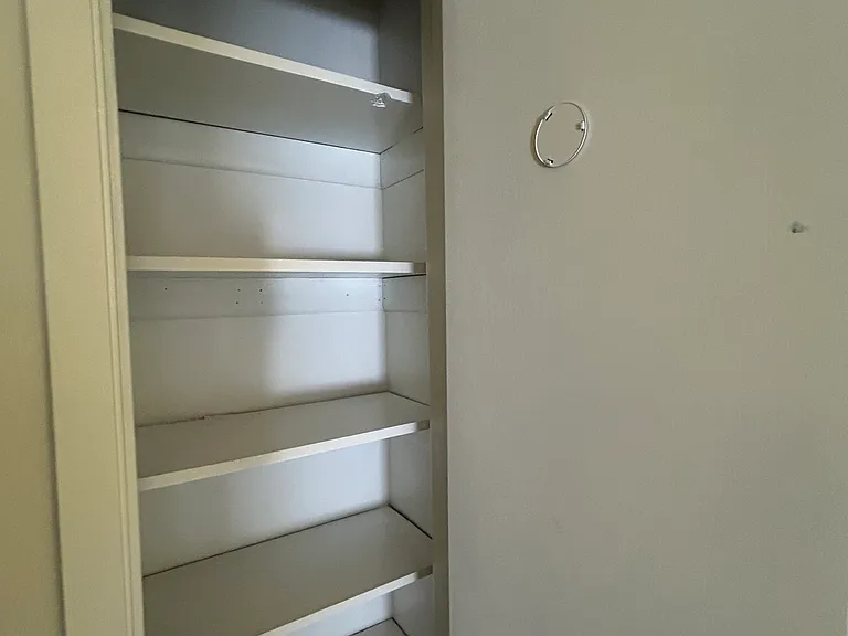 Hall closet by the bedrooms is a good sized closet to store all the extra linens...