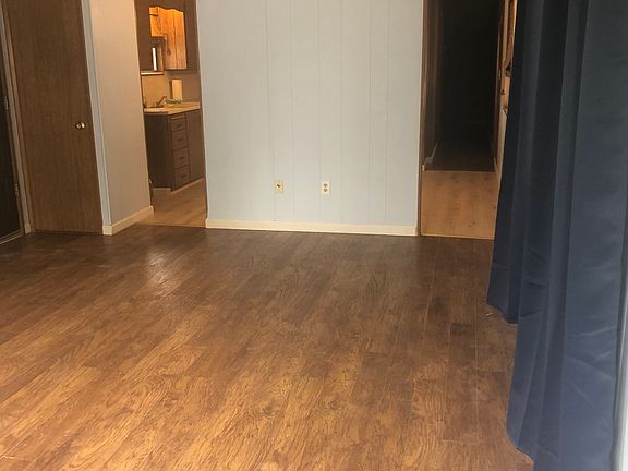 Living room facing kitchen
