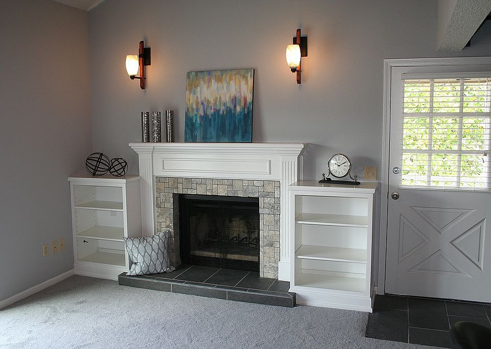 Fireplace w/builtin shelving