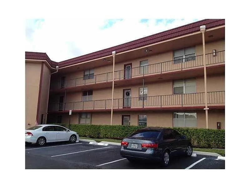Building Photo - 9301 Lime Bay Blvd #209