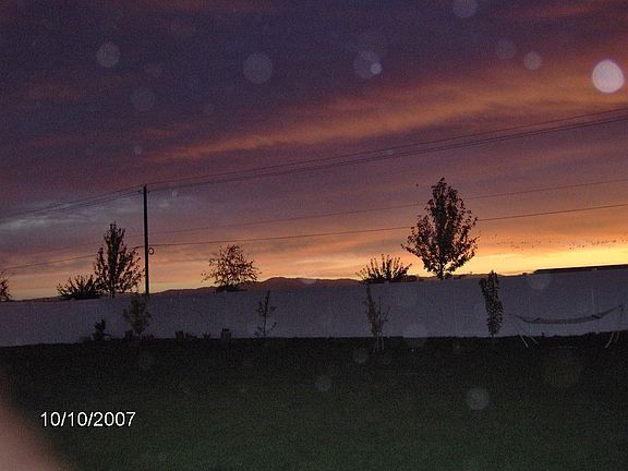 Sunrise From Backyard Can Relax in hot tub and see this sunrise it is beutiful