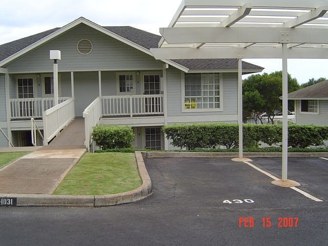 Front of unit w/prk. stall #430 right in front.