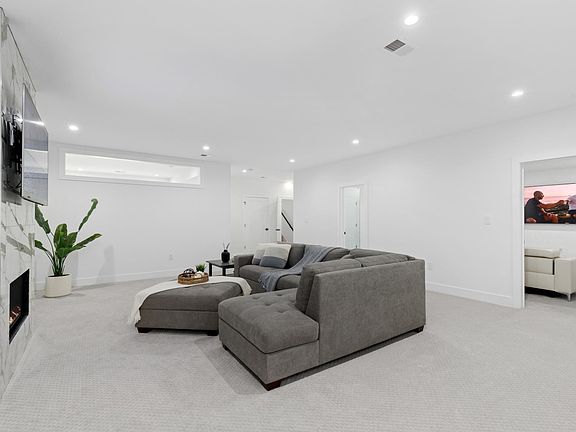 Wide view of the living room and and movie theater