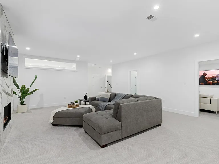 Wide view of the living room and and movie theater