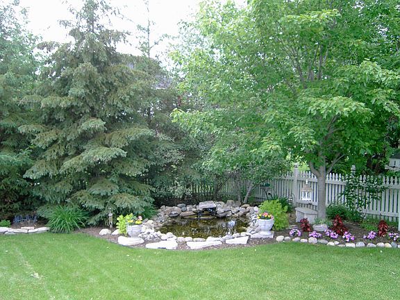 Landscaped Pond with Waterfall