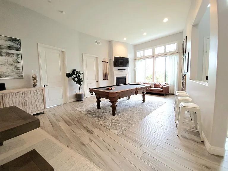 Great room with pool table and dining