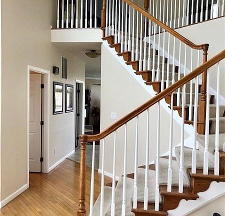 Wooden Staircase with Two-level Designing.