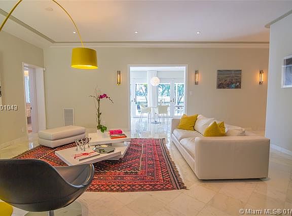 Mid-Beach Pool Home on Coveted La Gorce Country Club Golf Course