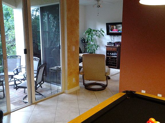 From living area, patio on left & view of sitting area