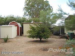 Backyard showing workshops and buildings