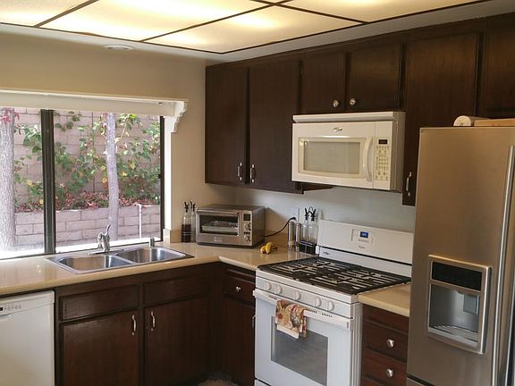 View of Kitchen overlooking Backyard
