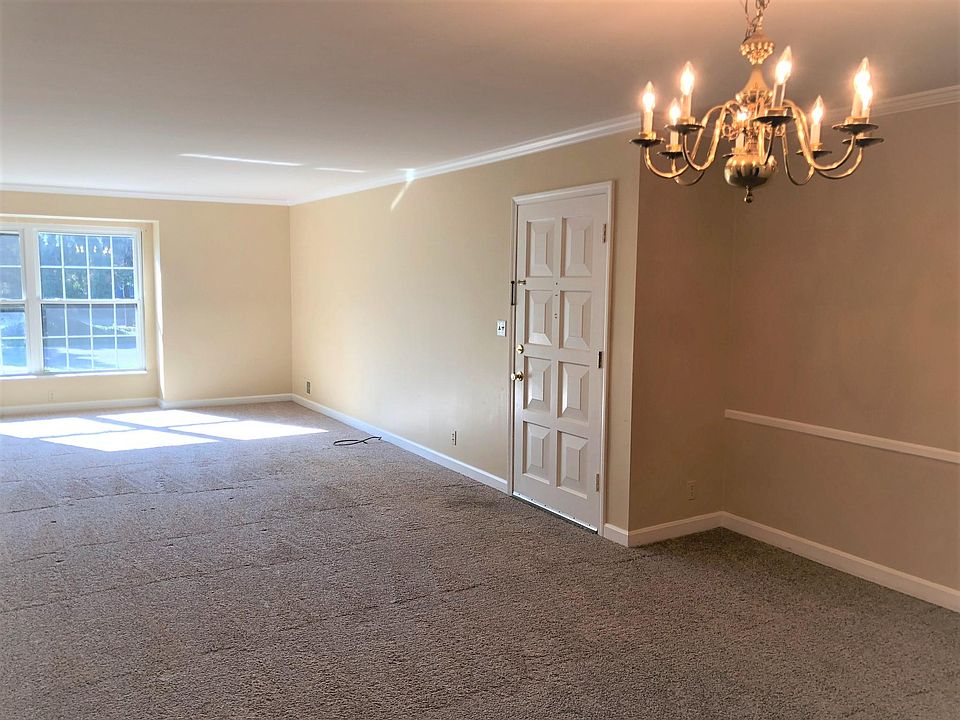 Front Entry to Open Living Room and Dining Room