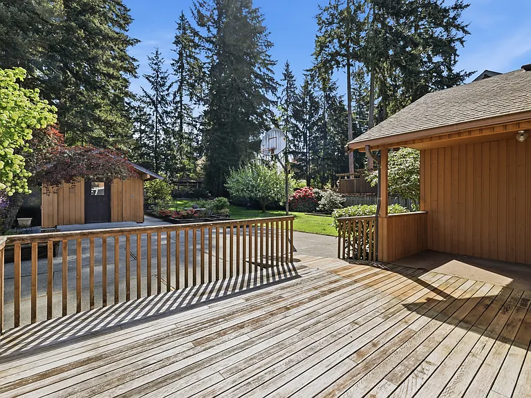Large deck with space to dine, relax, and entertain outdoors