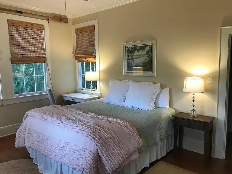 Bedroom with king size bed overlooking 10 acre pasture