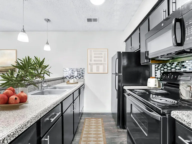 A1 Kitchen w/ Black Appliance Package & Backsplash