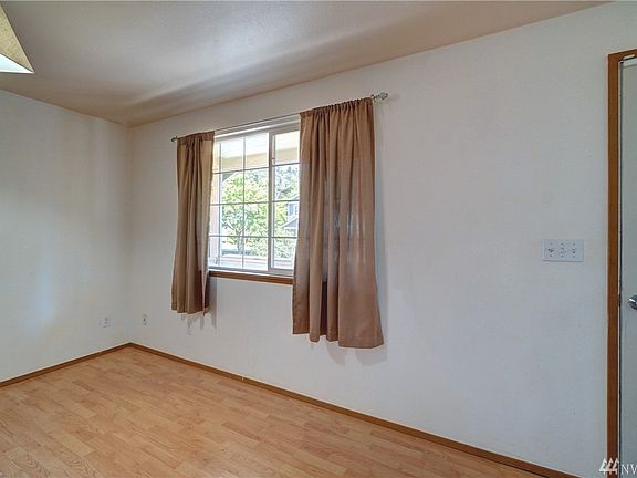 Your first stop is the light and bright living room.