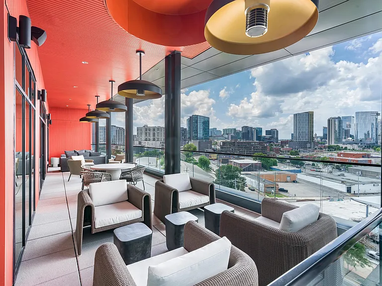 Sky lounge with plush seating and sweeping views of downtown Nashville_just one of many ways Modera SoBro elevates your everyday.