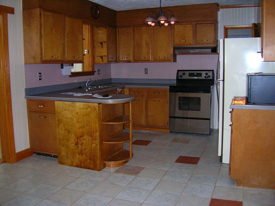 ceramic tile kitchen with eat in area