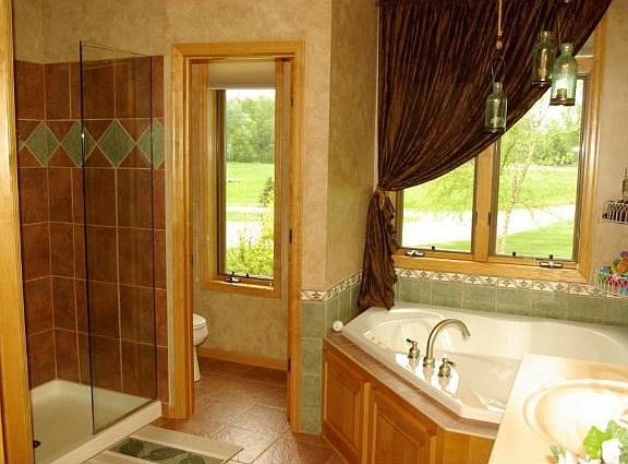 Luxury master bath w/ Shower, WP tub, separate toilet room