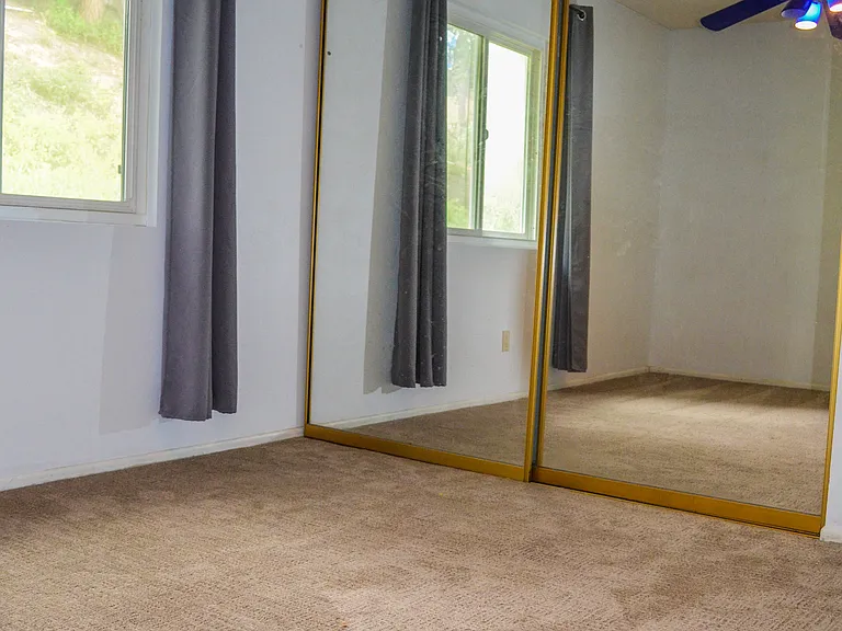 Bedroom 2, mirrored closet