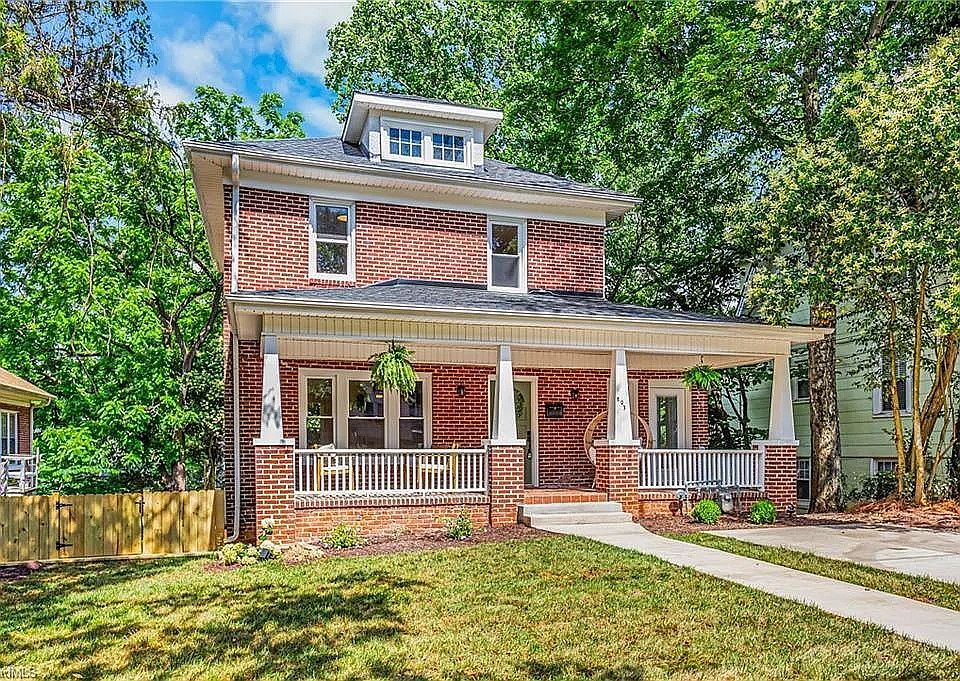 Front yard with parking spaces.