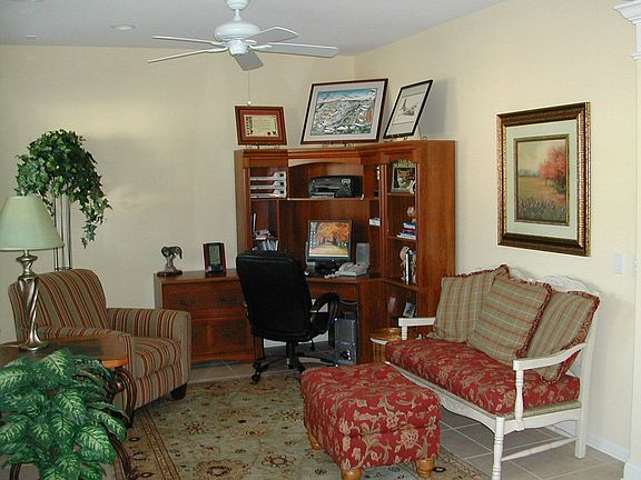 Library/den in front of home w/tile