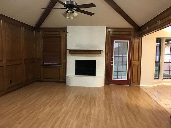 Fireplace is central to living area