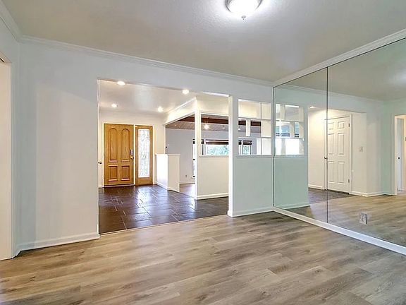 Formal dining room with mirror