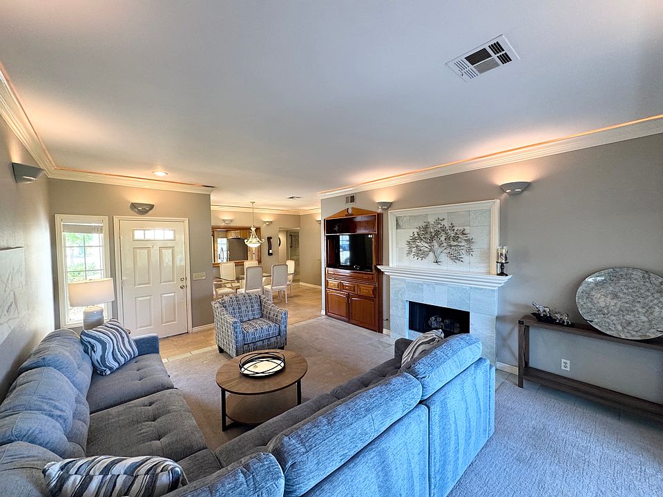 Living room area with built in media area for TV.