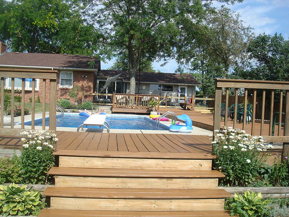 In-ground pool and deck