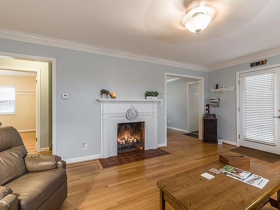 First floor has living room, dining room, kitchen, two bedrooms and a full bathroom.