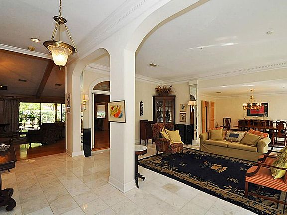 FORMAL LIVING ROOM OPENS OFF OF ENTRY