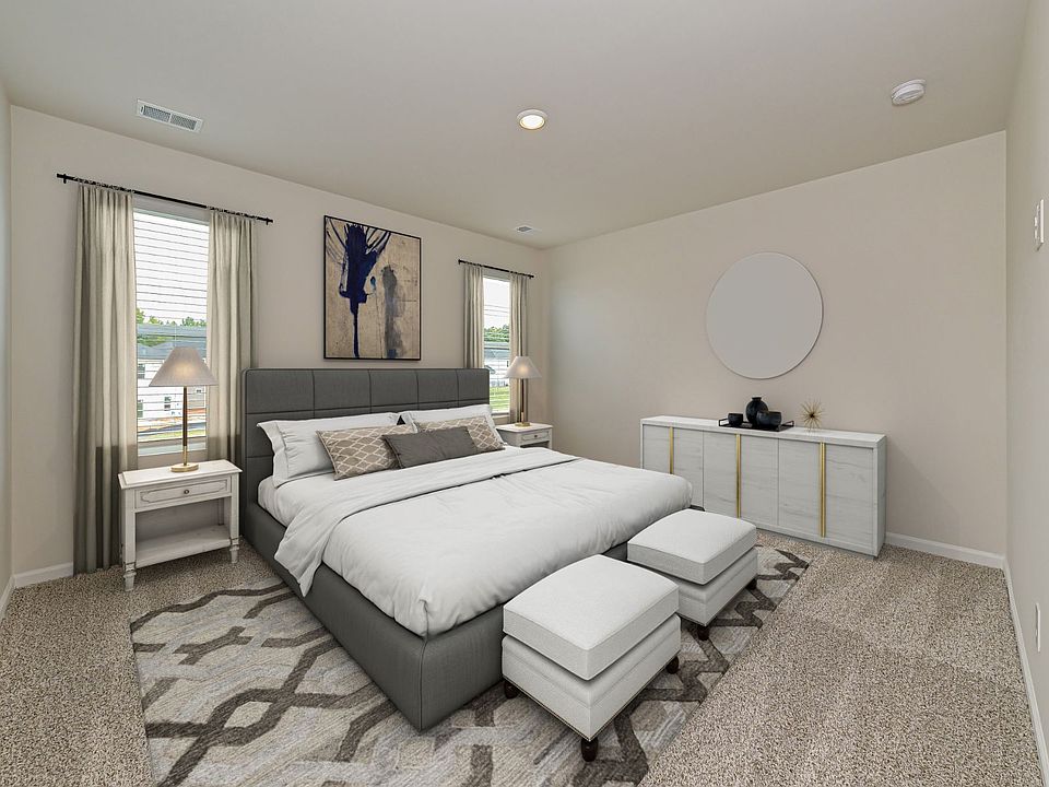 The primary bedroom is the best spot to relax and unwind after a long day.