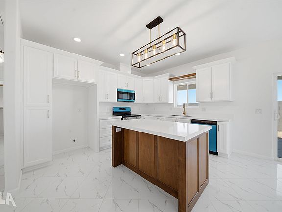 4th image of 10688 E 45th Pl
