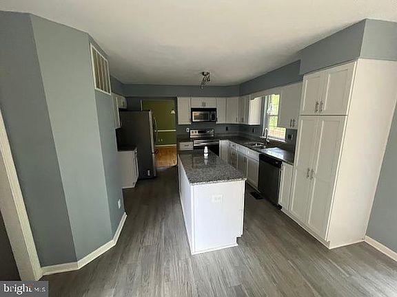4th image of 9121 Woodland Way N
