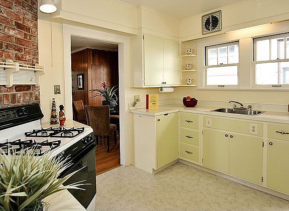 Comfortable kitchen with easy access to back patio and gardens