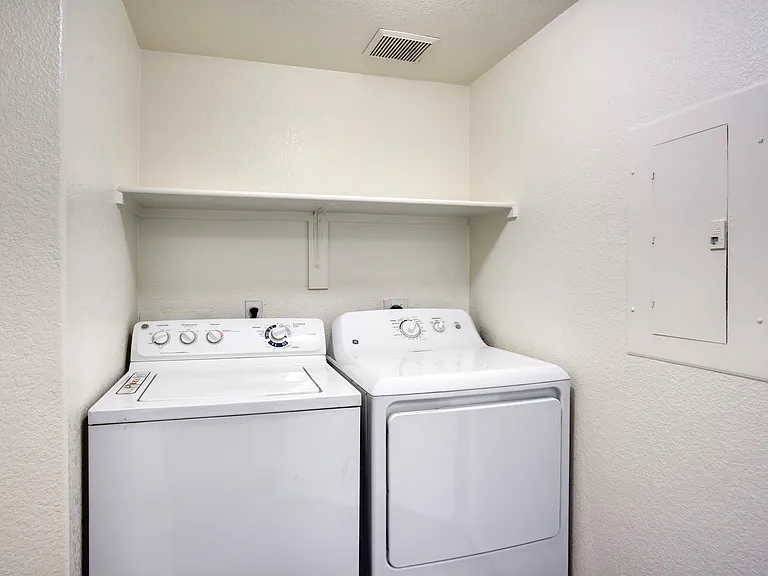 Simplify your routine with a washer and dryer inside your home.