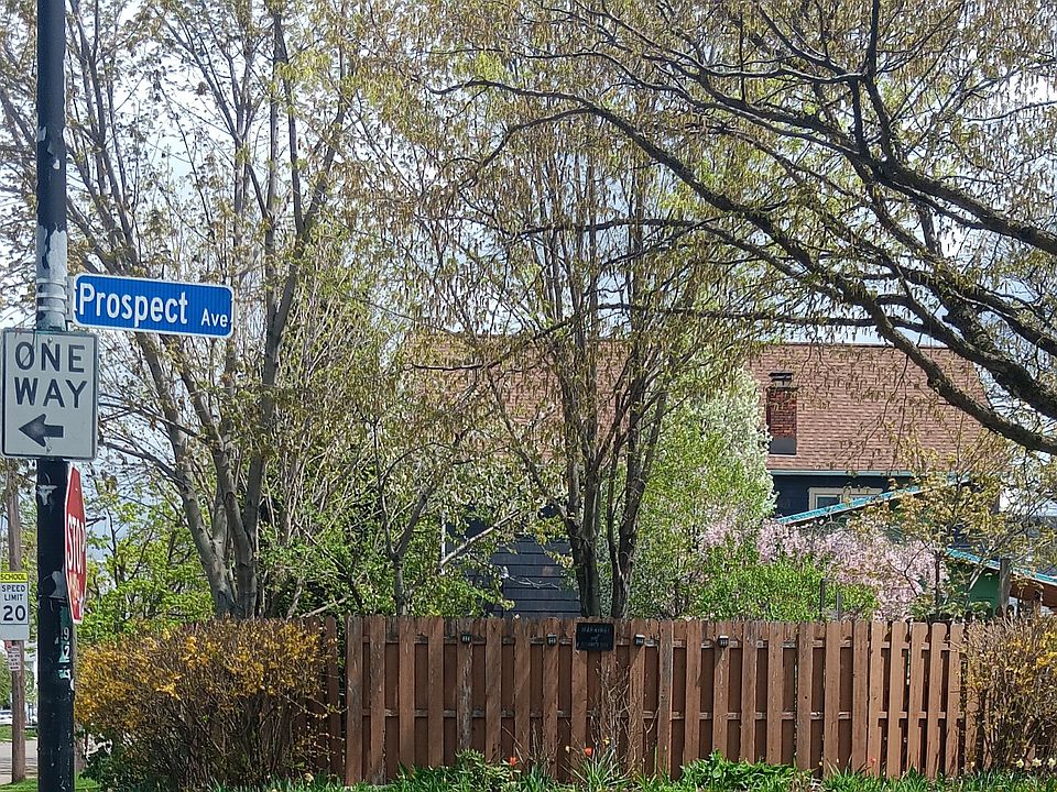 View of side yard, house in back ground from Prospect Ave.