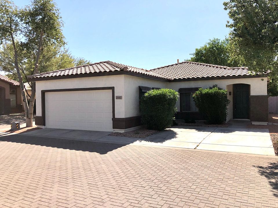 Exterior shot - 2 car garage and 2 carport parking
