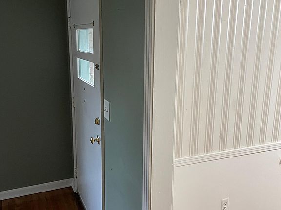 Front door, living room on the left, dining room on the right.