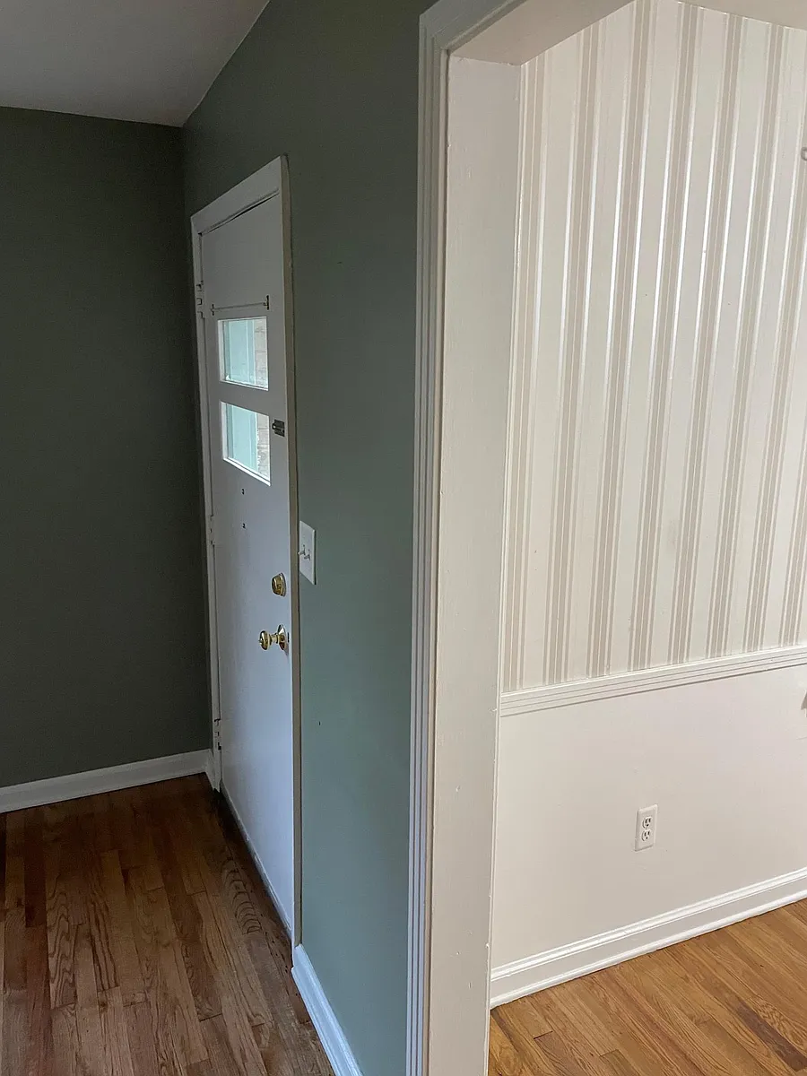 Front door, living room on the left, dining room on the right. - 2408 Hunting Valley Dr