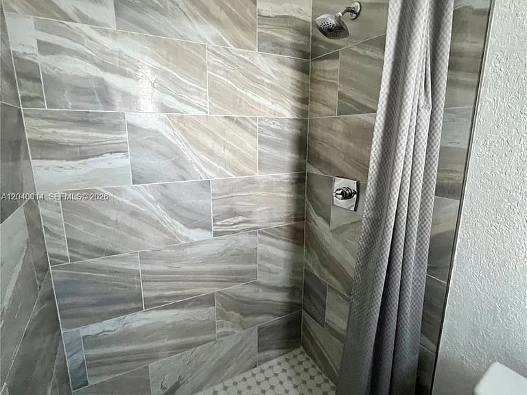 590 NW 40th Ct #3 — Photo 13