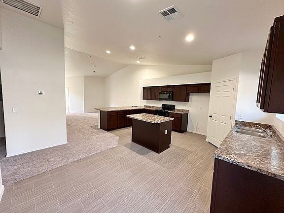 5th image of 7364 E 37th Pl