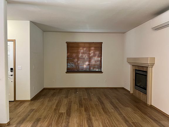 Living room area first floor. Gas fireplace.