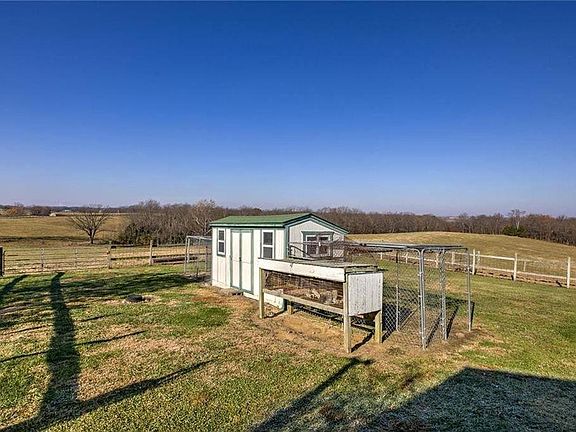 Chicken House with electricity and large fenced yard and rabbit hutch