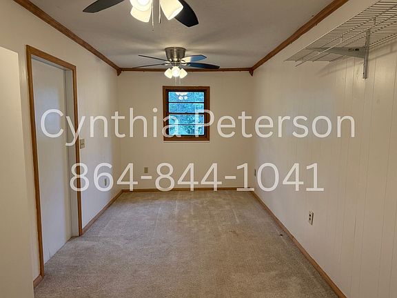 This is the hallway leading to the garage. In the past some tenants have used it as a bedroom.