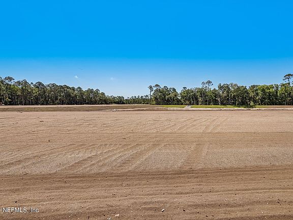 4th image of 117 WHISTLING PALM Court