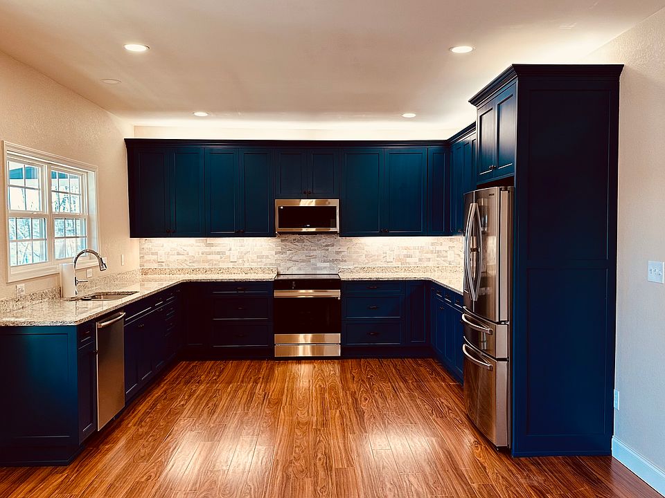 Brand new kitchen with granite counters and soft closing doors and drawers.