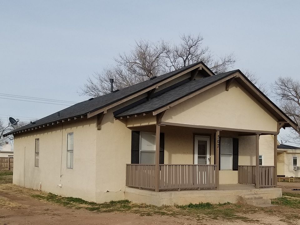 Front of the house looking at the south and west side.